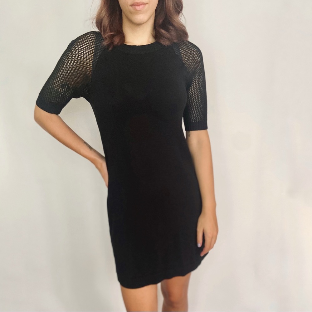 Short black dress with mesh netting detail